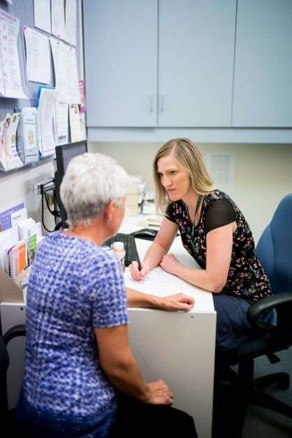 Dietitian with patient