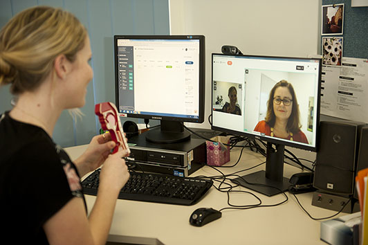 Brittany Vogels, A/Senior Speech Pathologist on a Telehealth consult in the SCGH Speech Pathology Department